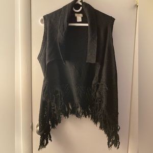 Black cardigan. Pairs well with white turtle neck!